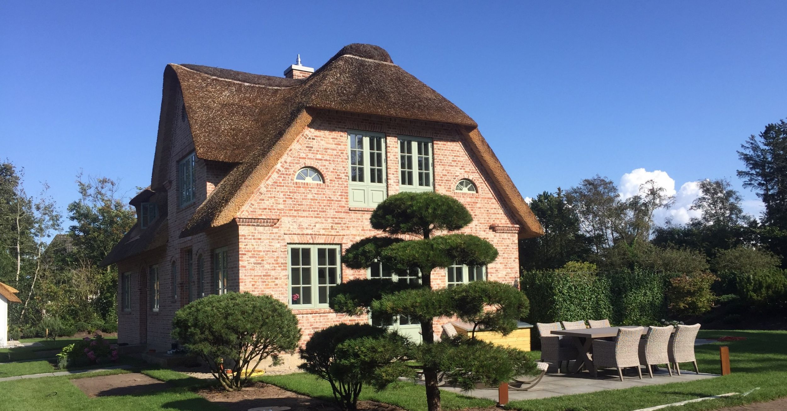 Reetdachhaus Narwal & Schwertwal